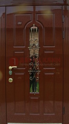 Красивая металлическая дверь со стеклом и ковкой ДСК-33 в Самаре